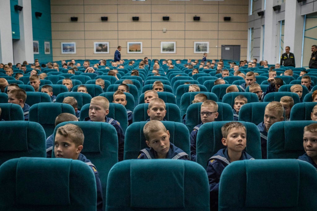 Murmansk, Kola Peninsula, Russia, September 2018. © Yuri Kozyrev – NOOR for Fondation Carmignac. Almost 300 cadets attend this school, named after the admiral Pavel Nakhimov (1802-1855), who was shot by a sniper at the Siege of Sevastopol. Over the last five years, eight other Nakhimov schools have been established countrywide under the decision of President Putin.