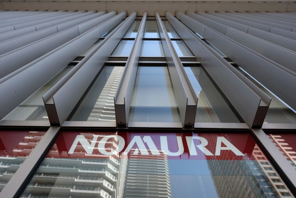 The Nomura Holdings Inc. logo. Photo by Akio Kon/Bloomberg/Getty Images.