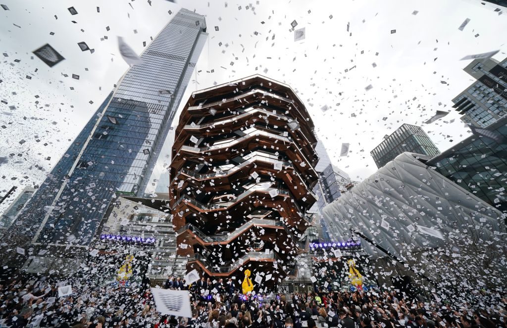 Confetti is showered during celebrations for the opening of New Yorks newest neighborhood, Hudson Yards, March 15, 2019. Photo by Timothy A. Clary/AFP/Getty Images.