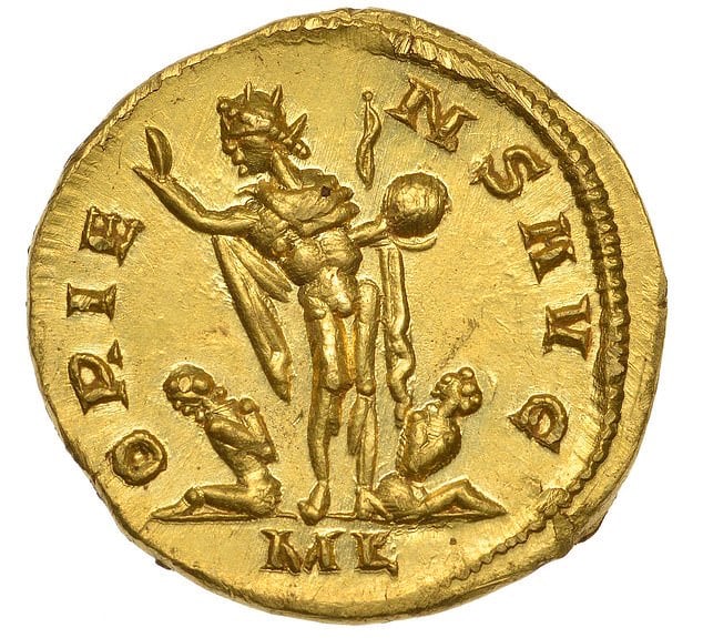 An amateur metal detectorist discovered this rare 24-carat gold Roman aureus coin in a field in Kent. The obverse shows the god Apollo and two captives. Photo courtesy of Dix Noonan Webb.