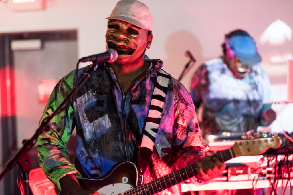 Moon Medicin performing on the opening night of "Subjective Cosmology," Sanford Biggers's 2016 solo exhibition at the Museum of Contemporary Art Detroit. Image courtesy of Sanford Biggers studio.