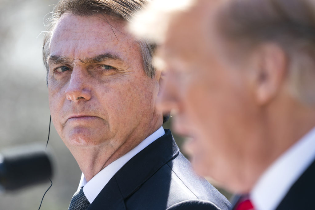 Brazilian President Jair Bolsonaro listens to U.S. President Donald Trump at a joint news conference in the Rose Garden at the White House March 19, 2019 in Washington, DC. Photo: Jim Lo Scalzo-Pool/Getty Images.