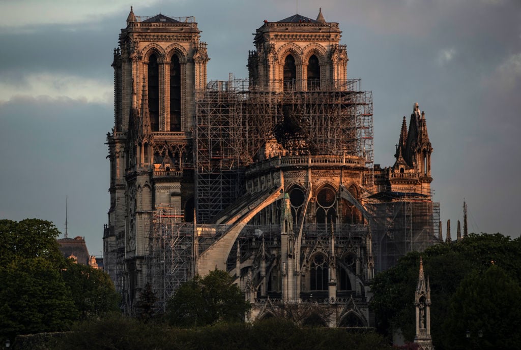 Notre-Dame Cathedral at sunrise following a major fire on Monday. Photo by Dan Kitwood/Getty Images.