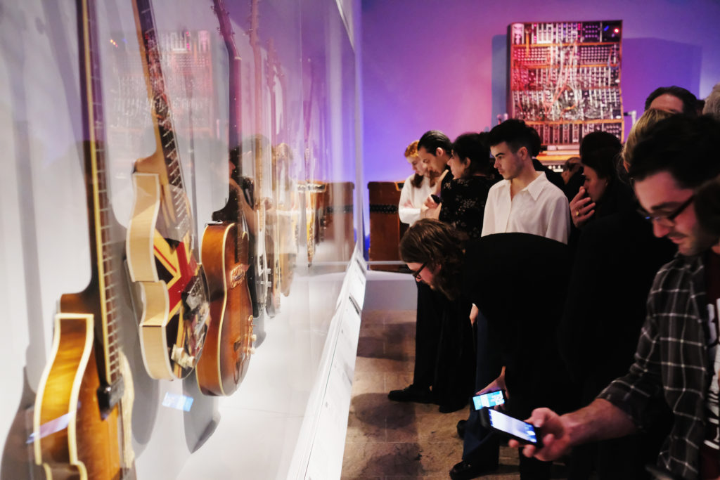 Visitors at the opening reception for "Play It Loud: Instruments Of Rock & Roll" at The Metropolitan Museum of Art, 2019. Photo: Nicholas Hunt/Getty Images.
