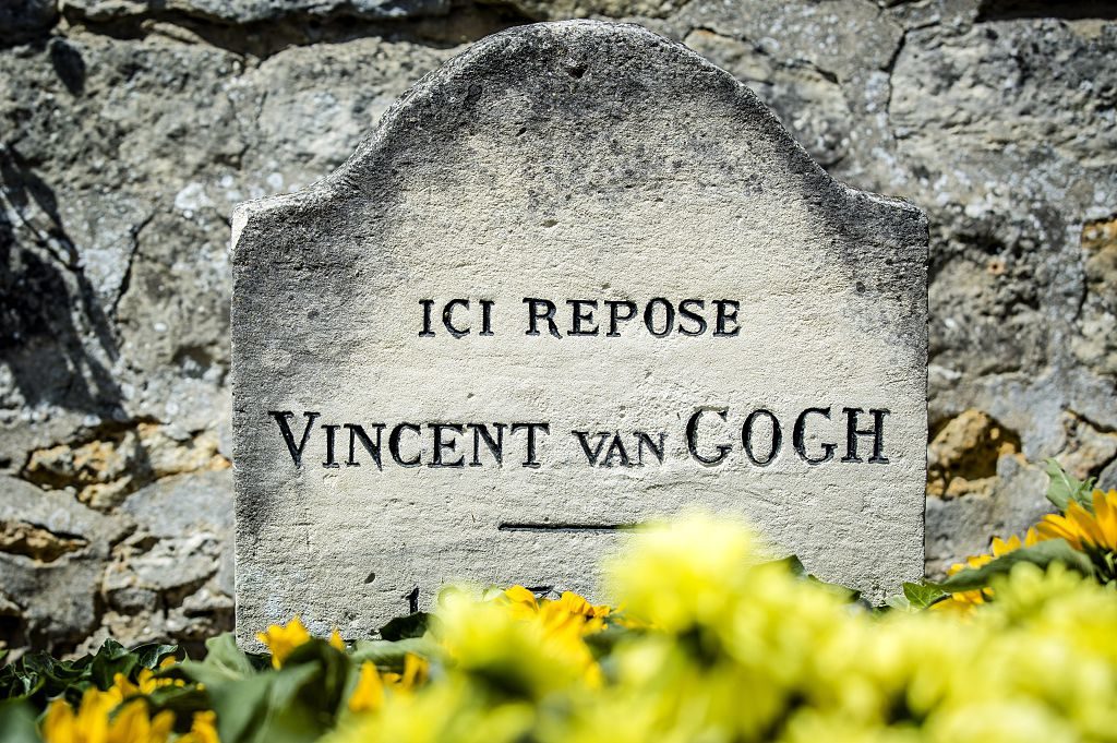 Sunflowers lie on the grave of Dutch painter Vincent van Gogh. Photo by Bart Maat/AFP/Getty Images.