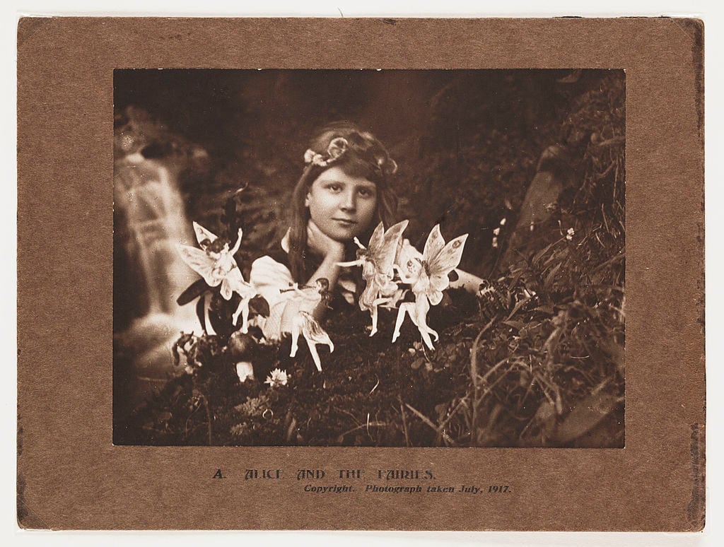 A photograph of Frances 'Alice' Griffiths taken by her cousin Elsie 'Iris' Wright. Photo by SSPL/Getty Images.