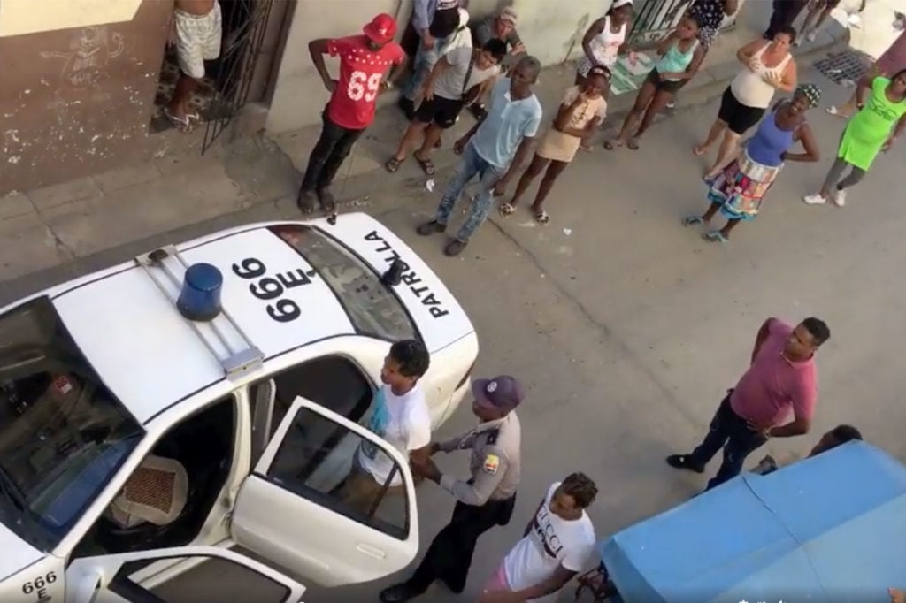 Cuban artist Luis Manuel Otero Alcántara being arrested on April 11, 2019, just before the opening of the Havana Biennial.
