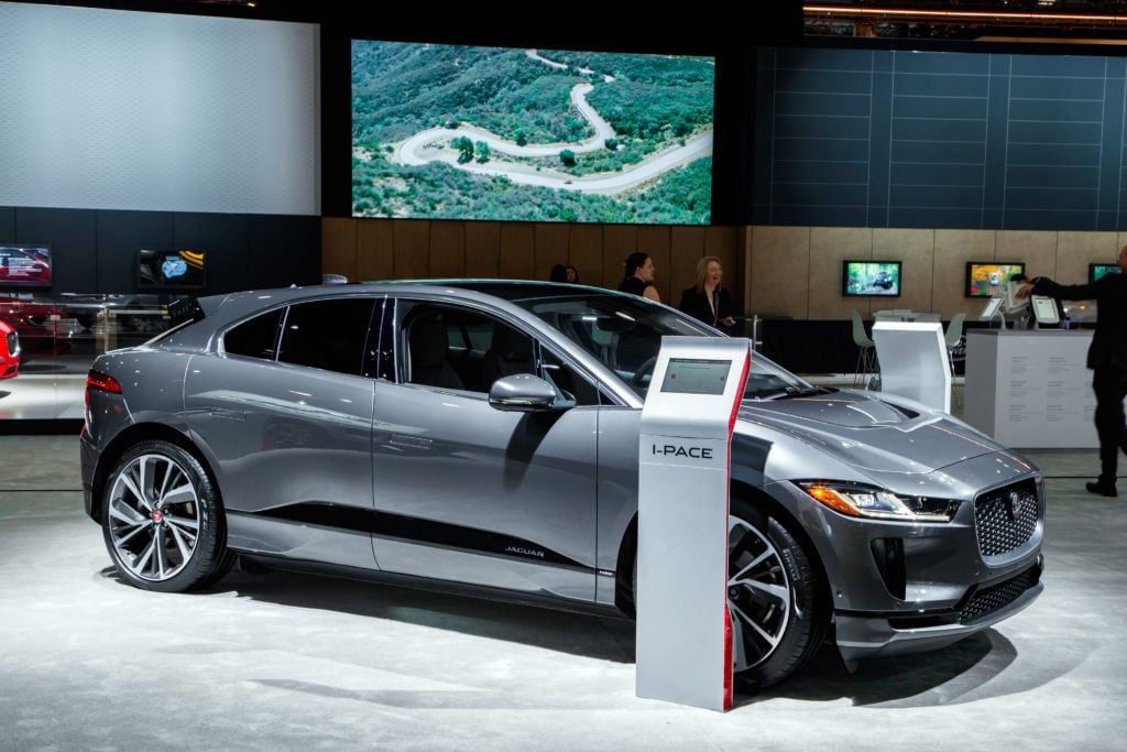 The Jaguar I-Pace, The 2019 World Car of the Year, sits on stage at the New York International Auto Show at the Jacob K. Javits Convention Center. Photo courtesy Jaguar.