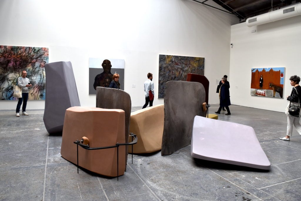 Nairy Baghramian, <em>Maintainers</em> (2019), with works by Julie Mehretu and Henry Taylor in the background. Image courtesy Ben Davis.
