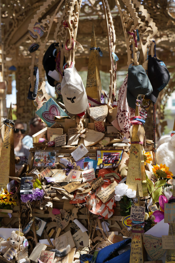Tributes left on David Best's memorial sculpture Temple of Time (2019). The artwork, which honors the 17 victims of the 2018 Parkland, Florida, shooting, was set on fire May 19, 2019. Photo by Nicole Craine, courtesy of Bloomberg Philanthropies.