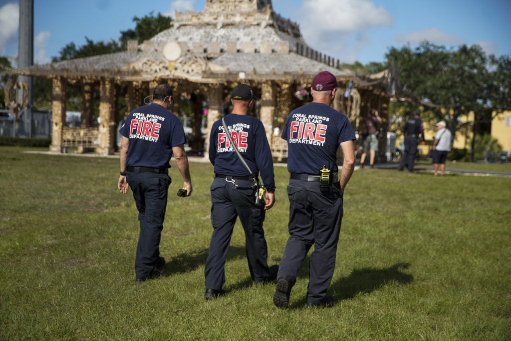 Firefighters were on hand as David Best's <em>Temple of Time</em> (2019), which honors the 17 victims of the 2018 Parkland, Florida, shooting, was set on fire May 19, 2019. Photo by Nicole Craine, courtesy of Bloomberg Philanthropies.