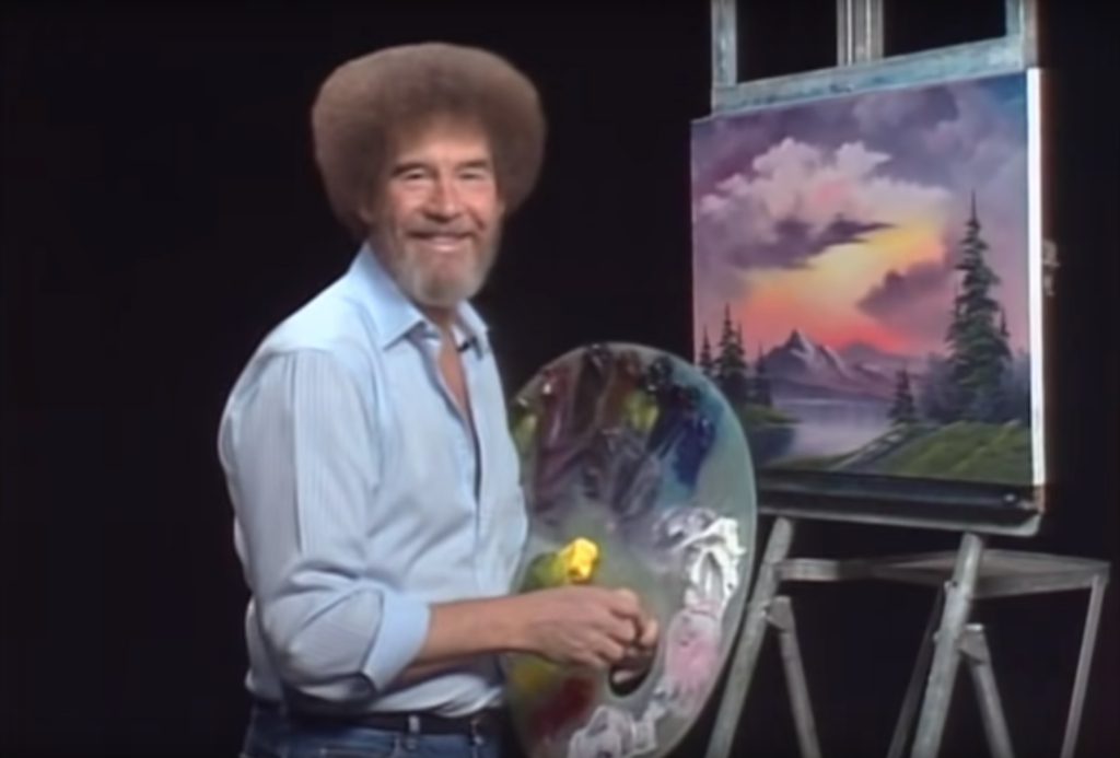 Bob Ross in The Joy of Painting. Photo via YouTube.