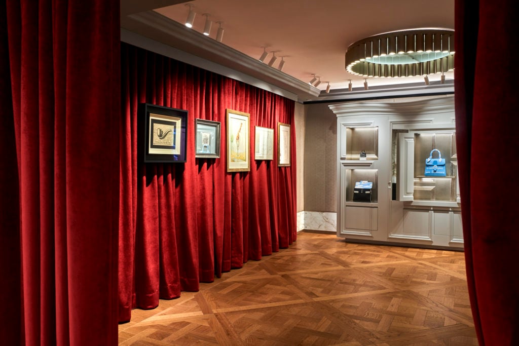 Magritte artworks displayed at the upper level of Delvaux's New York flagship store. Image courtesy Delvaux.