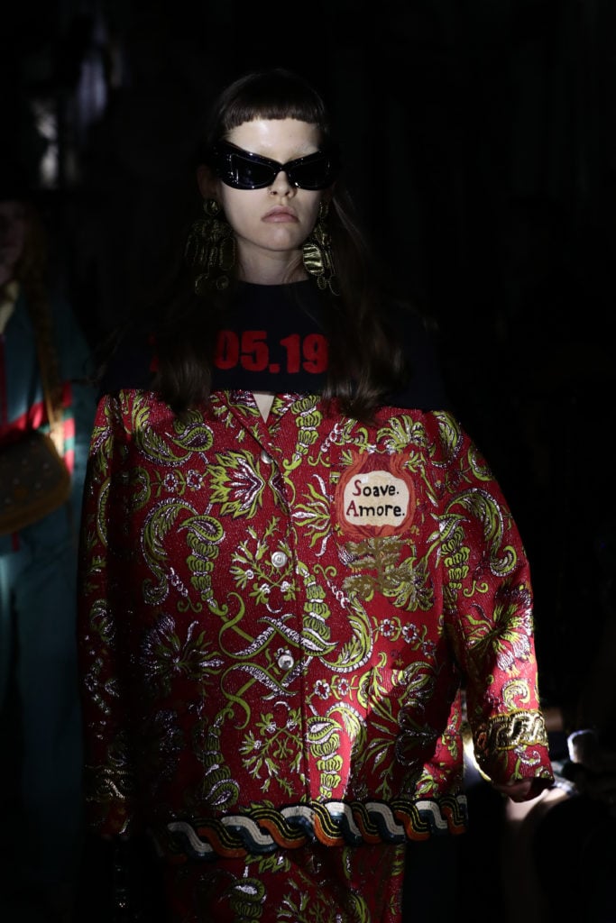 A capelet emblazoned with the date on which abortion became legally protected in Italy. Photo by Vittorio Zunino Celotto/Getty Images for Gucci.