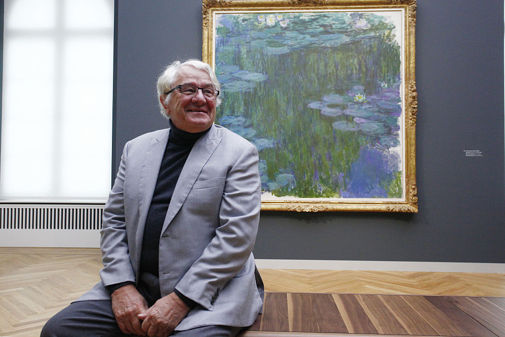 Hasso Plattner, who is co-founder of German software maker SAP and a financial backer of the Barberini Museum, poses in front of the painting of the french impressionist Monet titled Water Lilies during a press preview on January 19, 2017 in Potsdam, Germany. The art museum will have a permanent collection from Plattner's foundation that focuses on 20th century German art, both from West and East Germany. The museum opens to the public on January 23 with an exhibition on Impressionist landscapes. (Photo by Michele Tantussi/Getty Images) Local Caption *** Hasso Plattner; Ortrud Westheider.