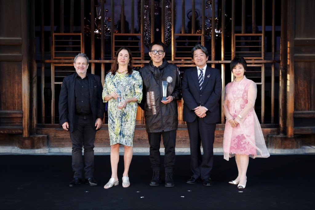 The Nomura Emerging Artist Award ceremony in Kyoto. From left, Allan Schwartzman, Kathy Halbreich, Cheng Ran, Hajime Ikeda, and Yuko Hasegawa. Courtesy of Nomura Holdings.