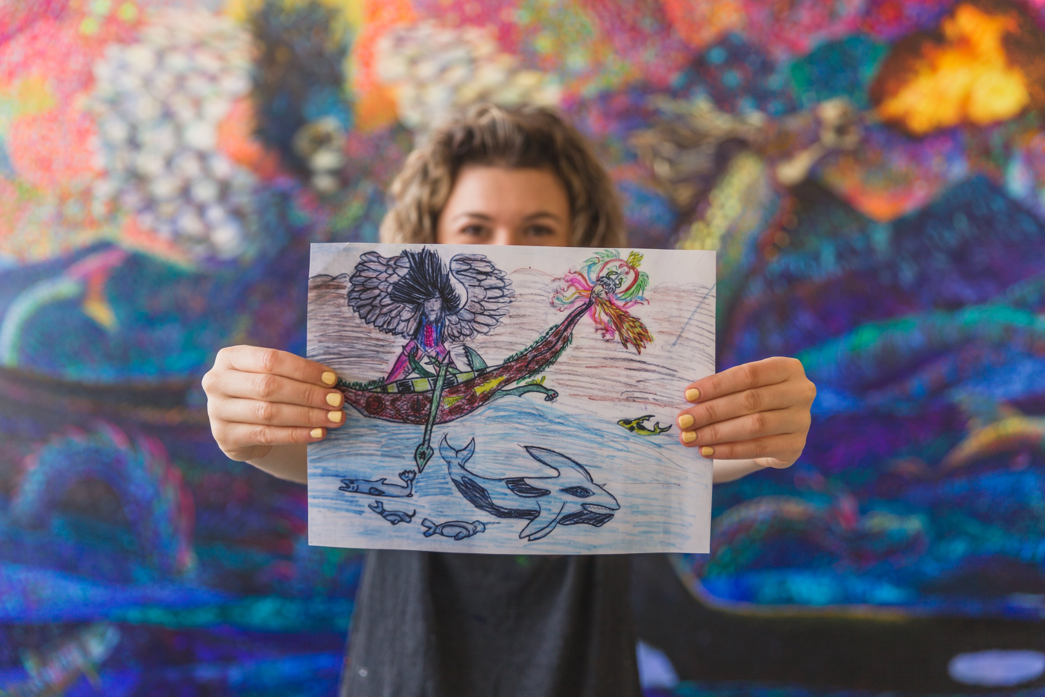 Iris Scott with a childhood drawing that is the basis for a work in her new show, "Ritual in Pairing." Photo by ErikNuenighoff.