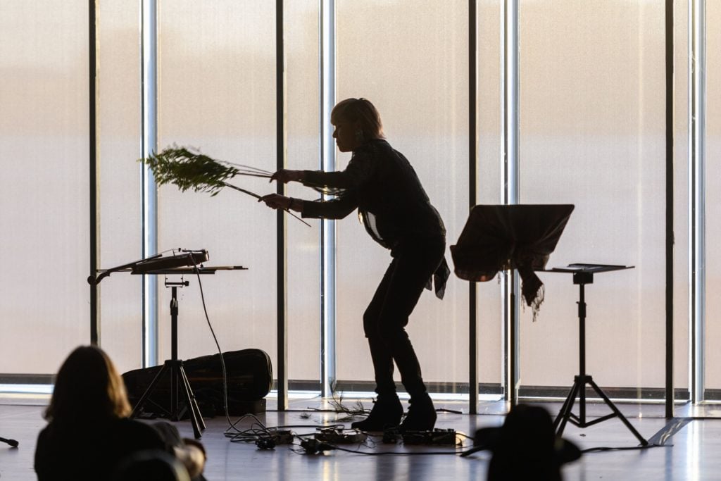 Laura Ortman performs at the Whitney, 2018. Photograph by Filip Wolak, courtesy the Whitney Museum of American Art.