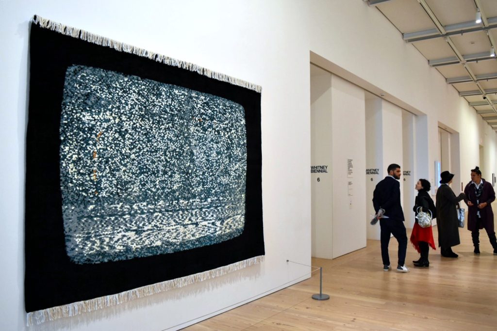 Nicholas Galanin, <em>White Noise, American Prayer Rug</em>, 2018, at the 2019 Whitney Biennial. Image courtesy Ben Davis.