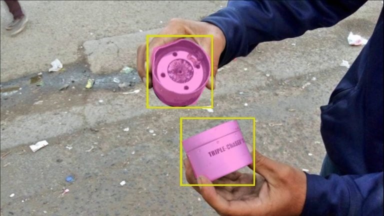 During the process of training a 'computer vision' classifier, bounding boxes and 'masks' tell the classifier where in the image the Triple-Chaser grenade exists. (Forensic Architecture/Praxis Films)