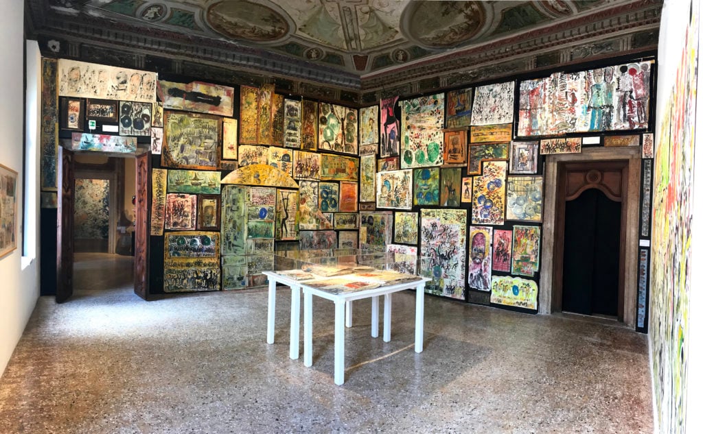Installation view of Purvis Young's multimedia works at Palazzo Mora for the Venice Biennale (2019). Courtesy of Skot Galerie.