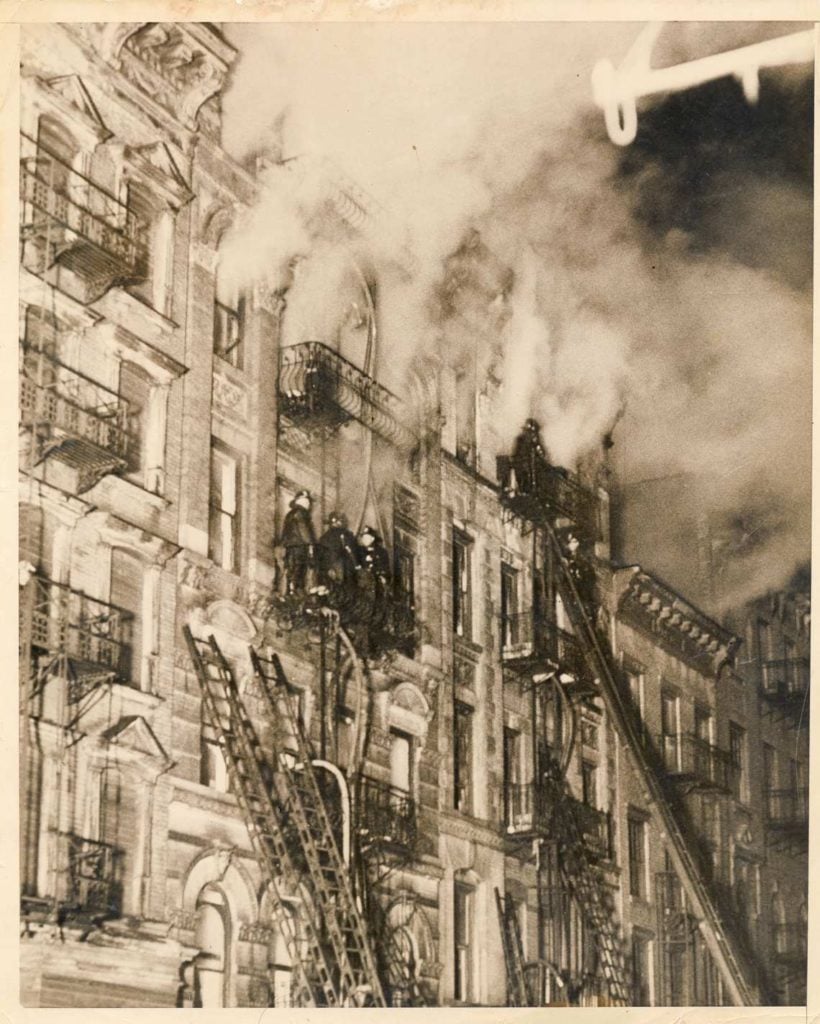 A newly discovered Weegee photograph of a late-night tenement fire at 139 Suffolk Street on March 4, 1937, that killed three. ©Weegee/International Center of Photography, New York.