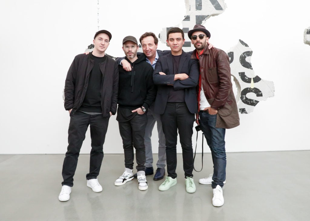 04.KAWS, Daniel Arsham, Emmanuel Perrotin, Ivan Argote and JR at Perrotin New York, 2017 © BFA.com