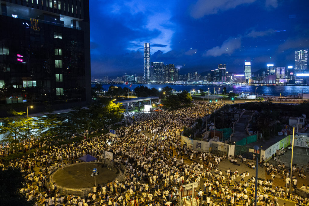 Demonstrators seen occupying the roads outside the legislative council building. In the early hours of June 10, hundreds of demonstrators clashed with the police as the demonstrators attempted to occupy the entrance of the legislative council building where the legislative council members are set to vote on the extradition bill on June 12. The clashes has caused at least 15 people injured including protesters, police officer and members of the press. Photo by Chan Long Hei/SOPA Images/LightRocket via Getty Images.