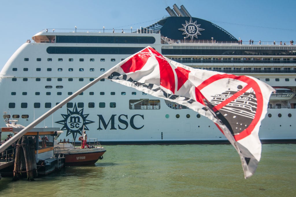 Protestors take action after a tourist river boat and a cruise liner collided on June 02, 2019 in Venice, Italy. Photo by Simone Padovani/Awakening/Getty Images.