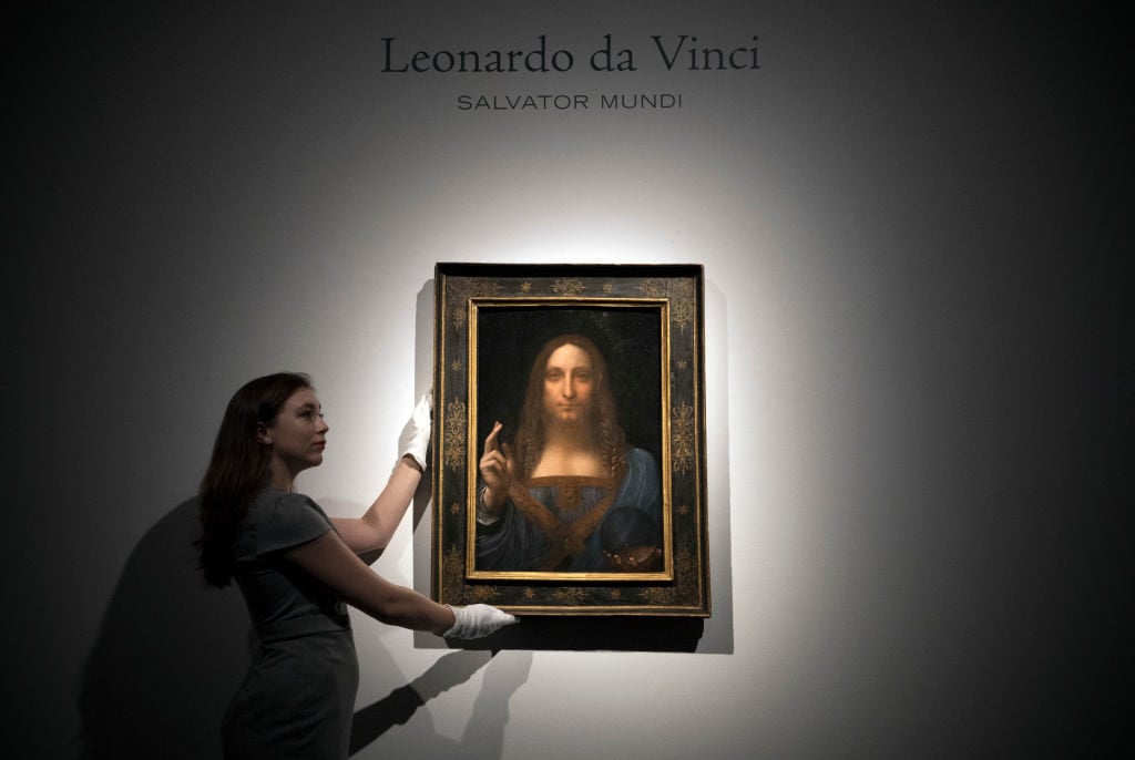<i>Salvator Mundi</i> before it is auctioned at Christies. Photo by Carl Court/Getty Images.