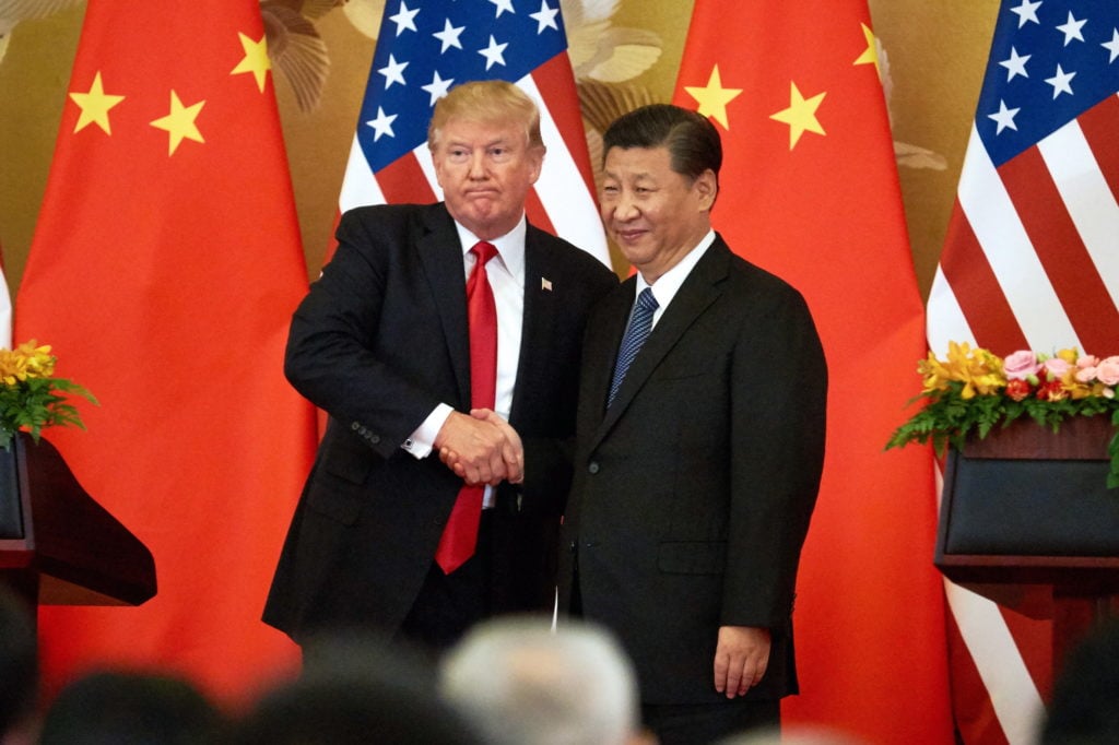 President Donald Trump and China's President Xi Jinping. Photo by Artyom IvanovTASS/Getty Images.