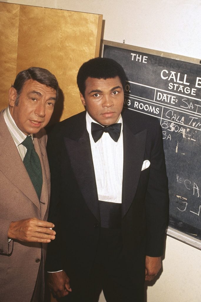 Isaac Sutton, Muhammad Ali and the sports journalist Howard Cosell backstage before the taping of “The Muhammad Ali Variety Special” in 1975. Photo courtesy of Johnson Publishing Company.