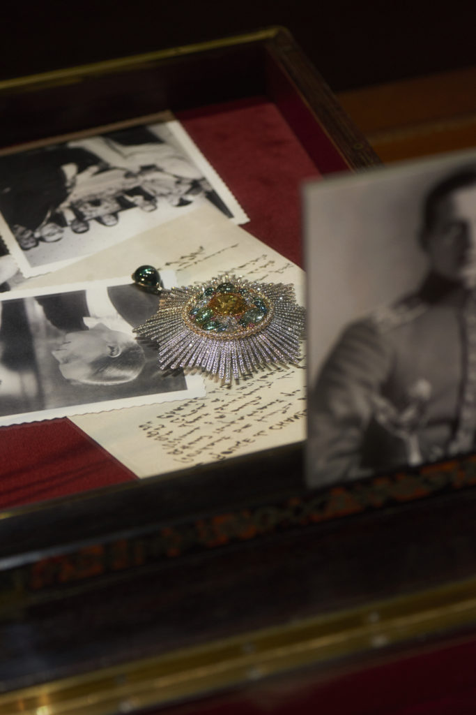 The Blé Maria brooch, displayed together with photos of Coco Chanel and her Russian paramour. Courtesy of Chanel.