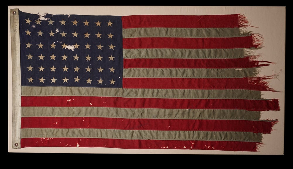 The 48-star flag flown on Landing Craft, Control 60 (LCC 60) off Utah Beach in Normandy, France was acquired by Dutch collector Bert Kreuk and his uncle Theo Schols and donated to the Smithsonian. Image courtesy of the Smithsonian.