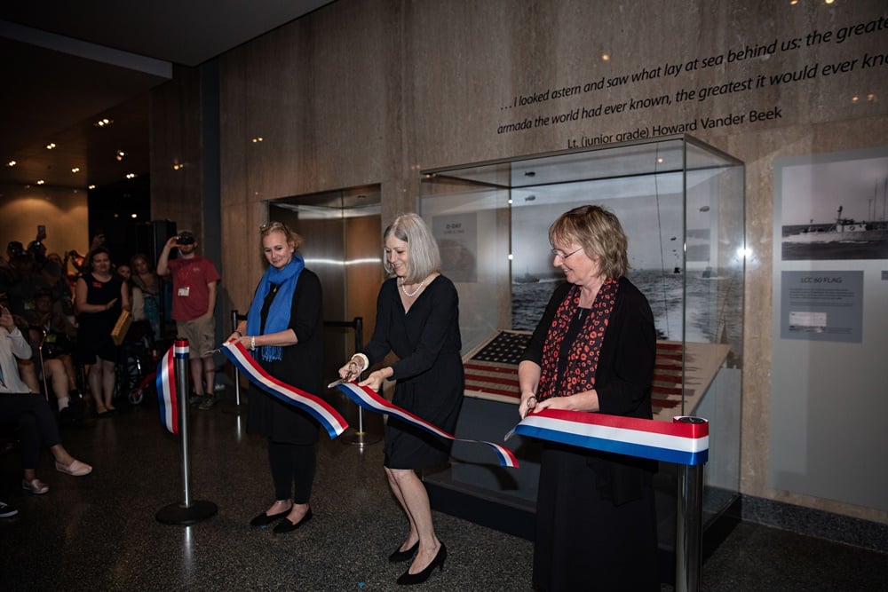 The ribbon cutting ceremony for donation of the D Day flag at the Smithsonian in Washington, D.C. <br>Image courtesy of the Smithsonian Institution.