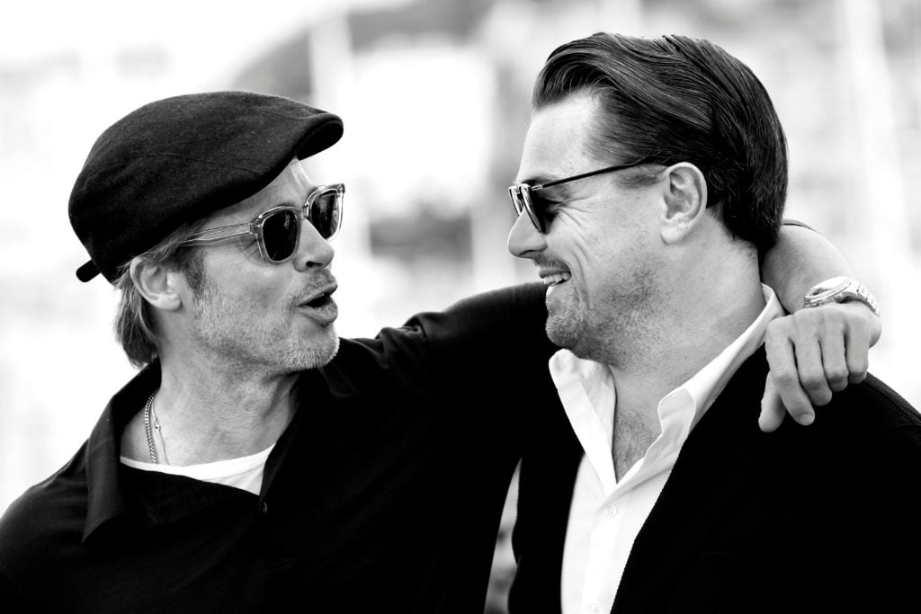 Brad Pitt and Leonardo DiCaprio pose during a photocall for the film 