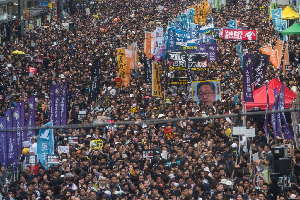 Protesters take part in a rally against extradition bill on July 1, 2019, in Hong Kong. Thousands of pro-democracy protesters faced off with riot police on Monday during the 22nd anniversary of Hong Kong's return to Chinese rule as riot police officers used batons and pepper spray to push back demonstrators. (Photo by Billy H.C. Kwok/Getty Images)