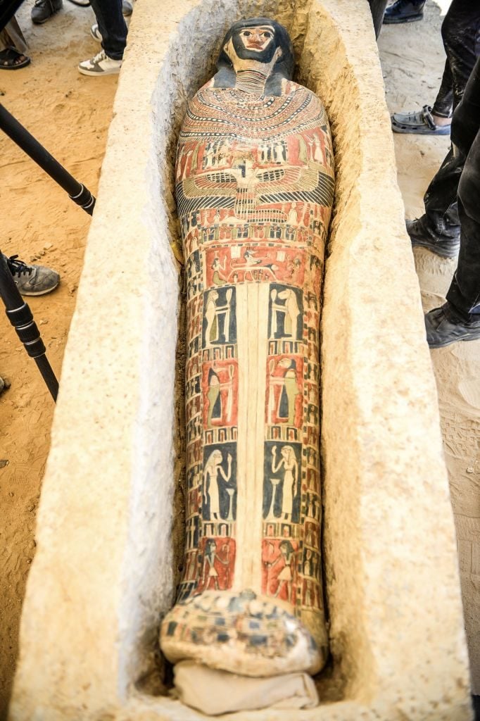 A sarcophagus, part of a new discovery carried out almost 300 meters south of King Amenemhat IIs pyramid at Dahshur necropolis, is exposed near the Bent Pyramid, about 40km (25 miles) south of the Egyptian capital Cairo, during an inaugural ceremony of the pyramid and its satellites, on July 13, 2019. Photo: Mohamed el-Shahed/AFP/Getty Images.