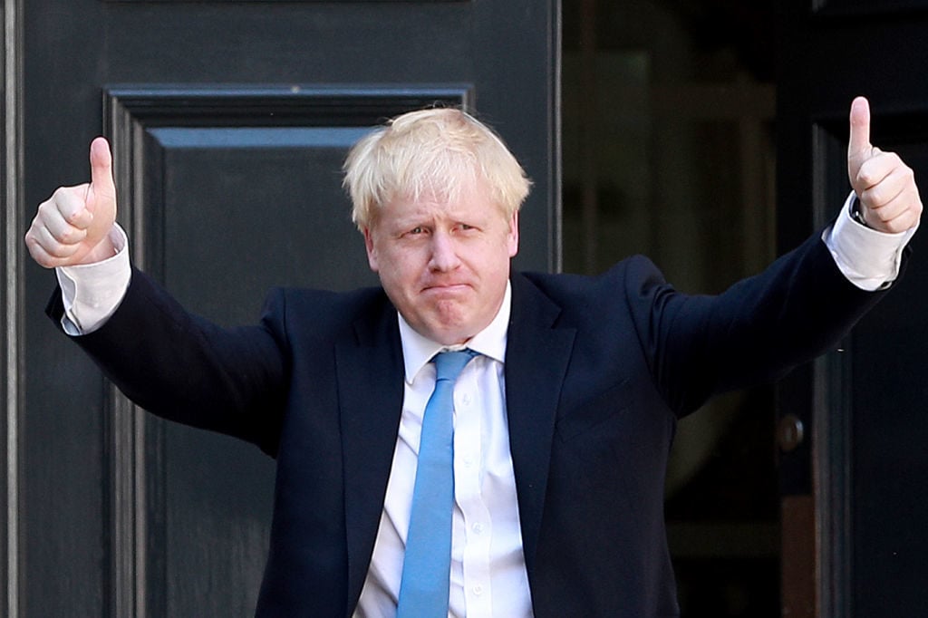 Newly elected Conservative party leader Boris Johnson poses outside the Conservative Leadership Headquarters on July 23, 2019 in London, England. Photo by Dan Kitwood/Getty Images.