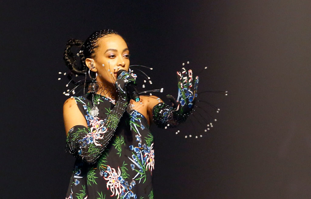 Solange Knowles performs during the runway during the Kenzo Menswear Spring Summer 2020 show as part of Paris Fashion Week. Photo by Thierry Chesnot/Getty Images.
