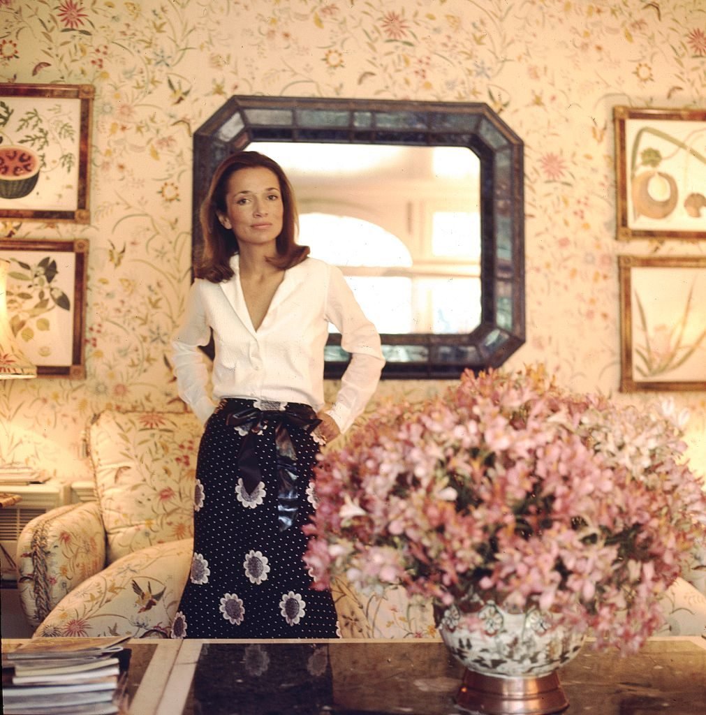 Portrait of Princess Lee Radziwill in front of mirror at the Turville Grange near Buckinghamshire, England. Photo: Horst P. Horst/Condé Nast via Getty Images.