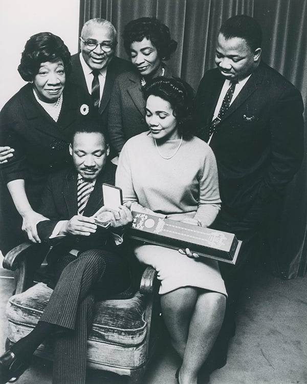 Moneta Sleet Jr., Martin Luther King Jr., surrounded by his family, holding the Nobel Peace Prize medal 1964. Photo courtesy Johnson Publishing Company