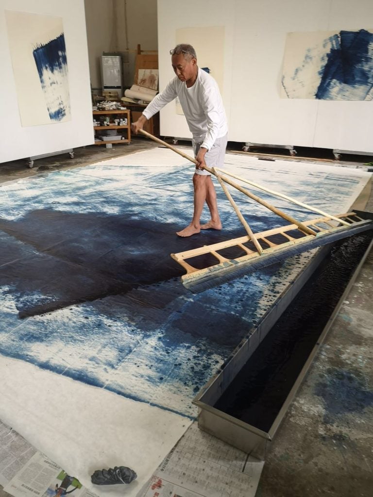 Zhang Wei at work in his Beijing Studio (2019). Courtesy of Galerie Max Hetzler.