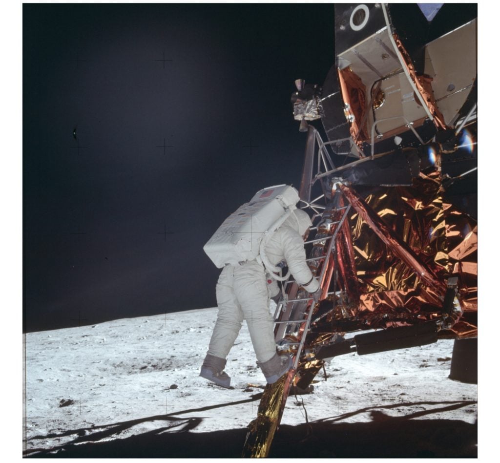 Still image of Buzz Aldrin descending the ladder of the Lunar Module. Photo: NASA, courtesy of Sotheby's. 