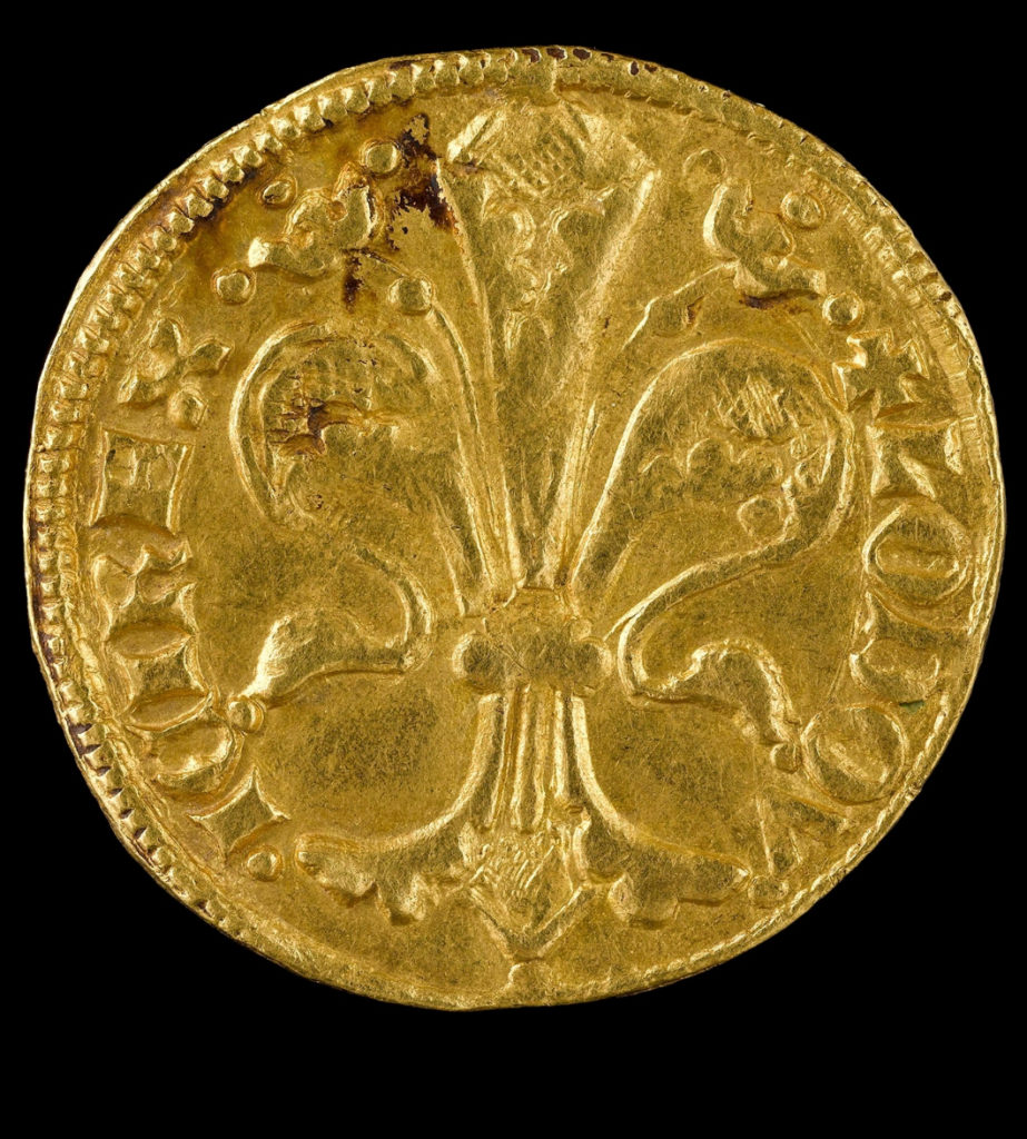 At left, a gold florin of Louis of Hungary from the Colmar Treasure (1342-53). Jewish families with more than 20 florins to their name had to pay a gold florin as an annual tax to the Holy Roman Empire. Photo courtesy of the Musée de Cluny – Musée national du Moyen Âge, RMN-Grand Palais/Art Resource, New York.