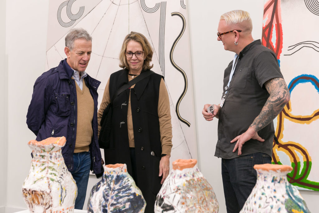 Visitors engaging with gallerists at Frieze Los Angeles. Photo: Mark Blower, courtesy of Frieze.