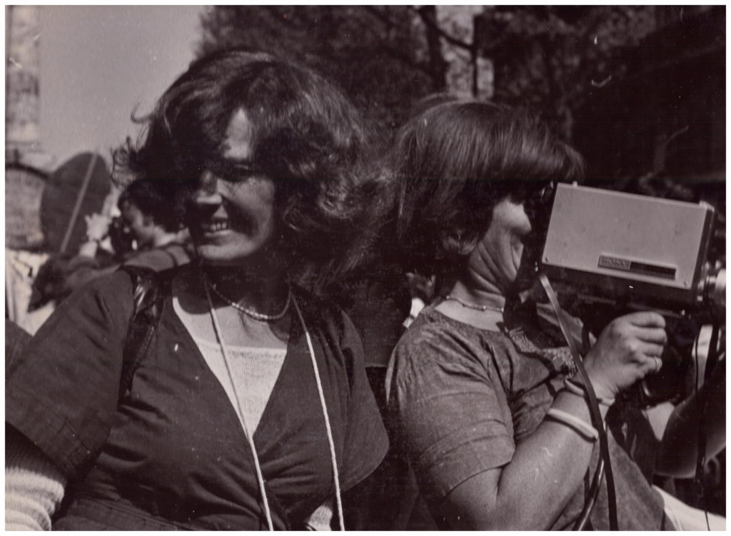 Micha Dell-Prane, <i>Delphine Seyrig and Ioana Wieder holding a camera during a demonstration</i>, (1976). Courtesy of Centre audiovisuel Simone de Beauvoir