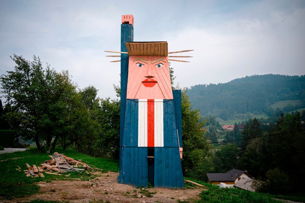 A wooden structure made to resemble US President Donald Trump in the village of Sela pri Kamniku, Slovenia. Photo credit should read JURE MAKOVEC/AFP/Getty Images.