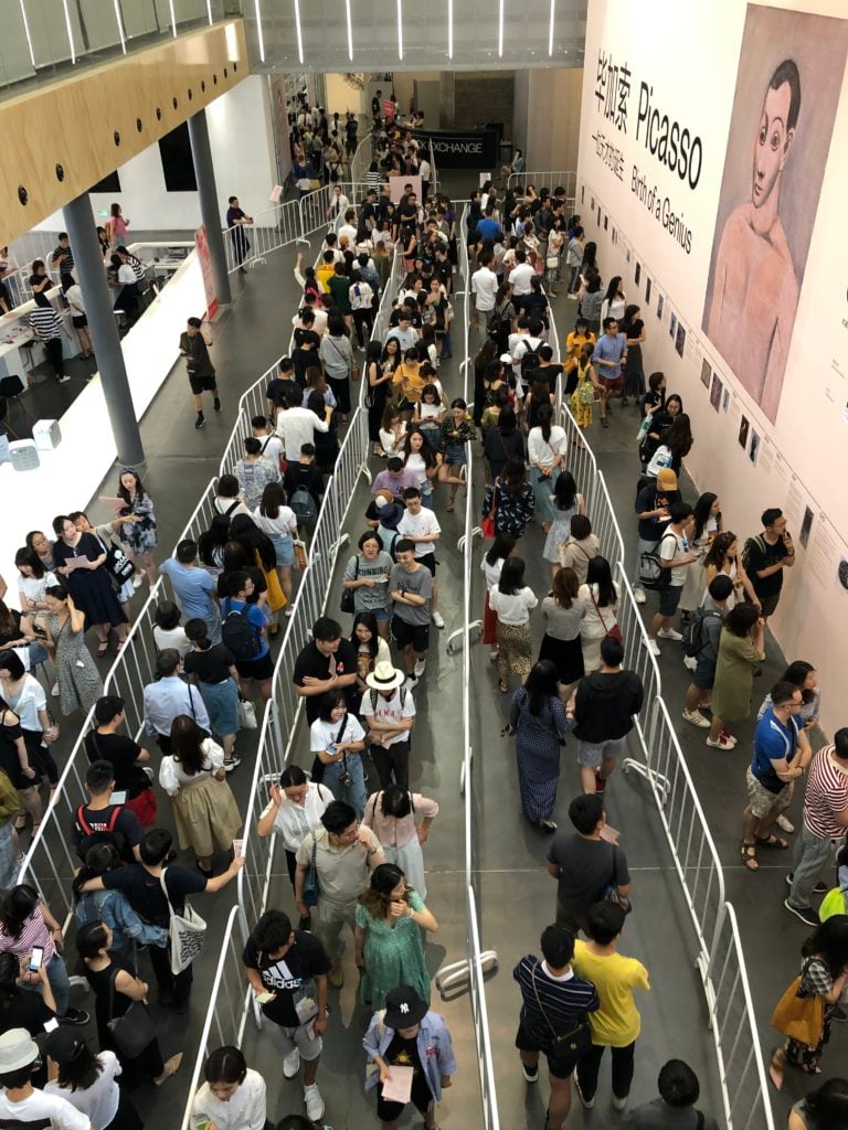 Crowds waiting in line for the UCCA’s Picasso survey. Courtesy UCCA.