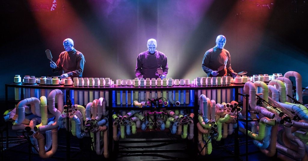 The Blue Man Group playing their PVC pipe instrument. Photo by Lindsey Best.